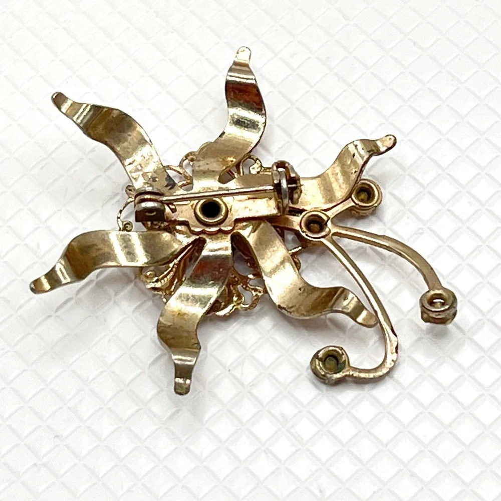 Vintage Gold Tone Flower Brooch w/ Blue and Clear Rhinestones